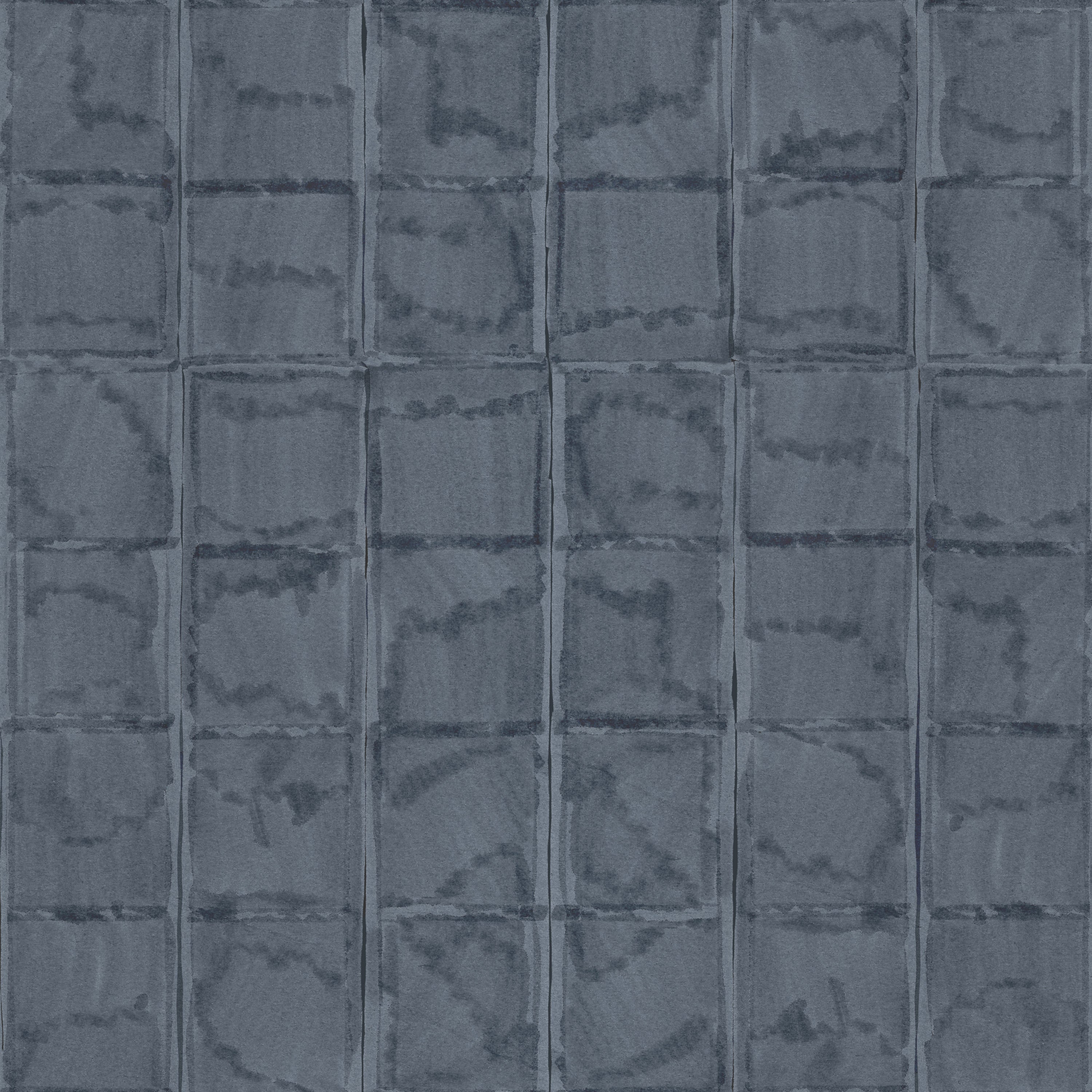 Detail of wallpaper in a textural block print in mottled blue-black.