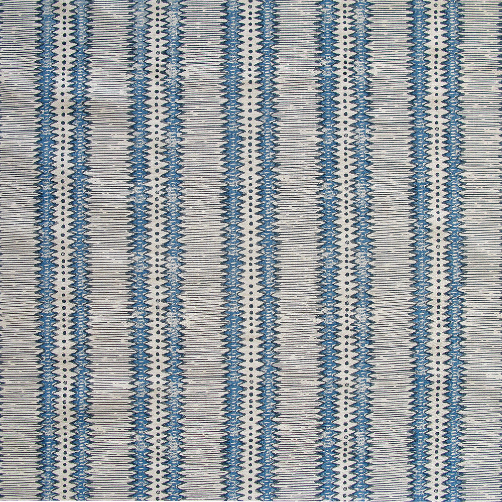 Detail of fabric in a dense tribal stripe pattern in shades of greige, blue and charcoal.