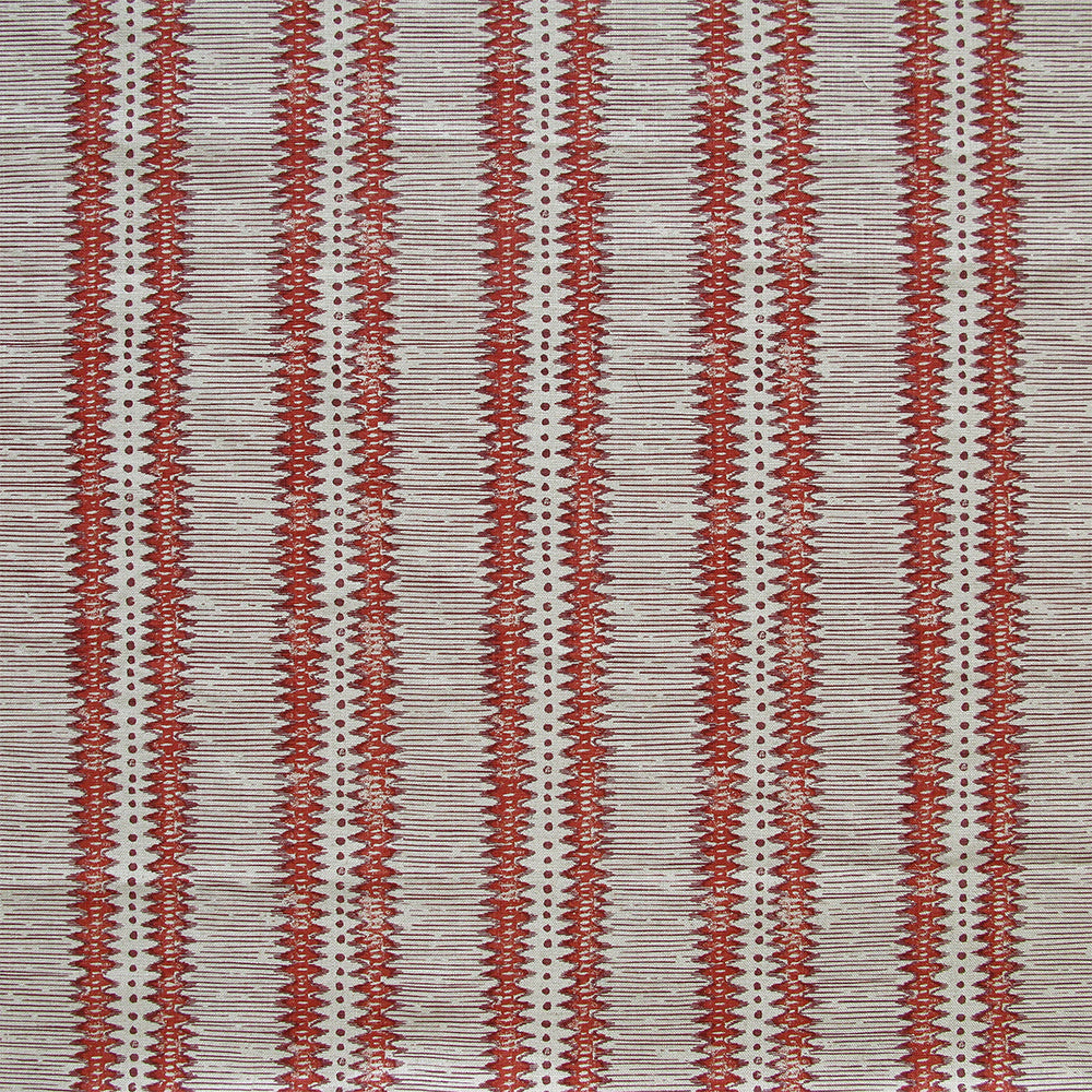 Detail of fabric in a dense tribal stripe pattern in shades of gray and red.