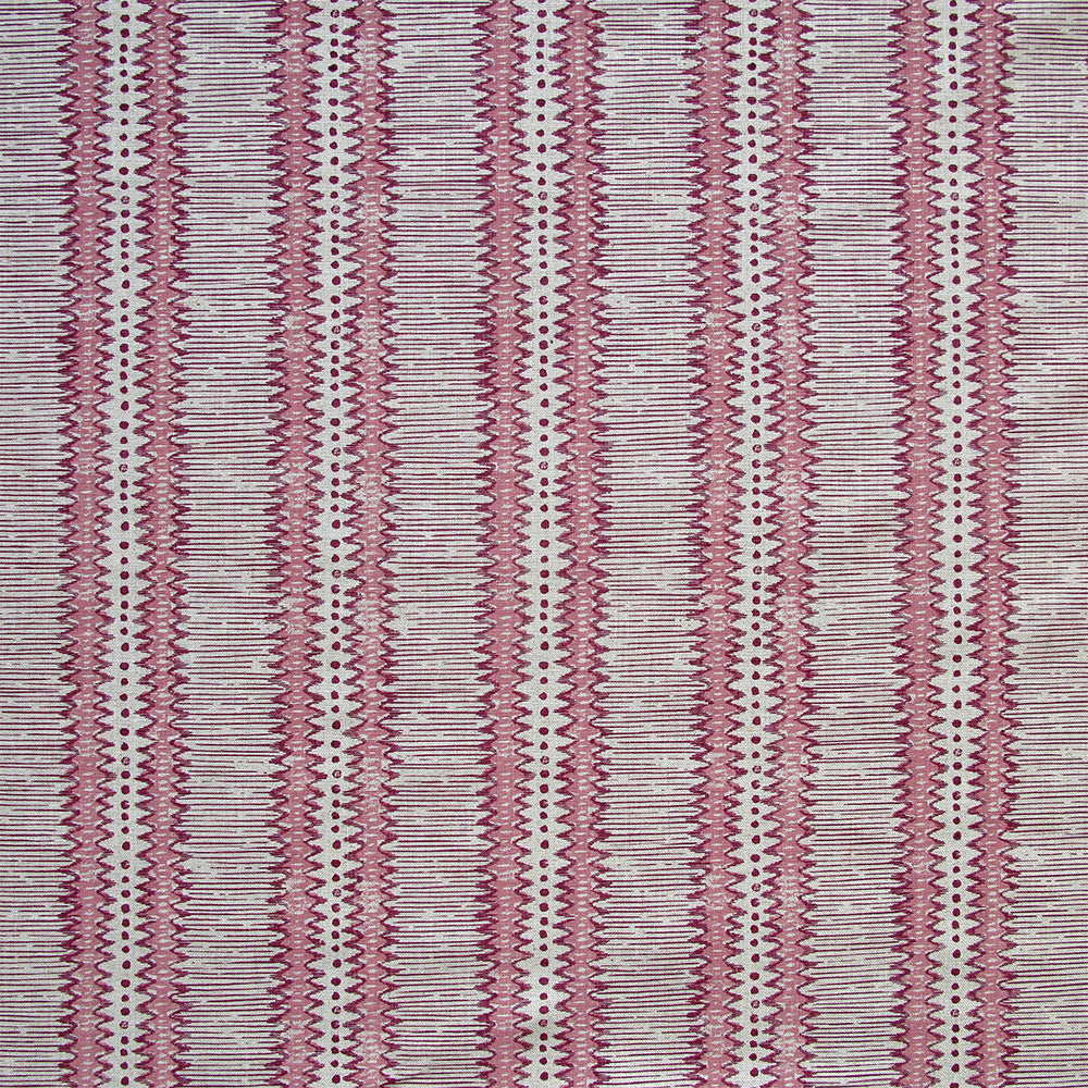Detail of fabric in a dense tribal stripe pattern in shades of gray, pink and maroon.