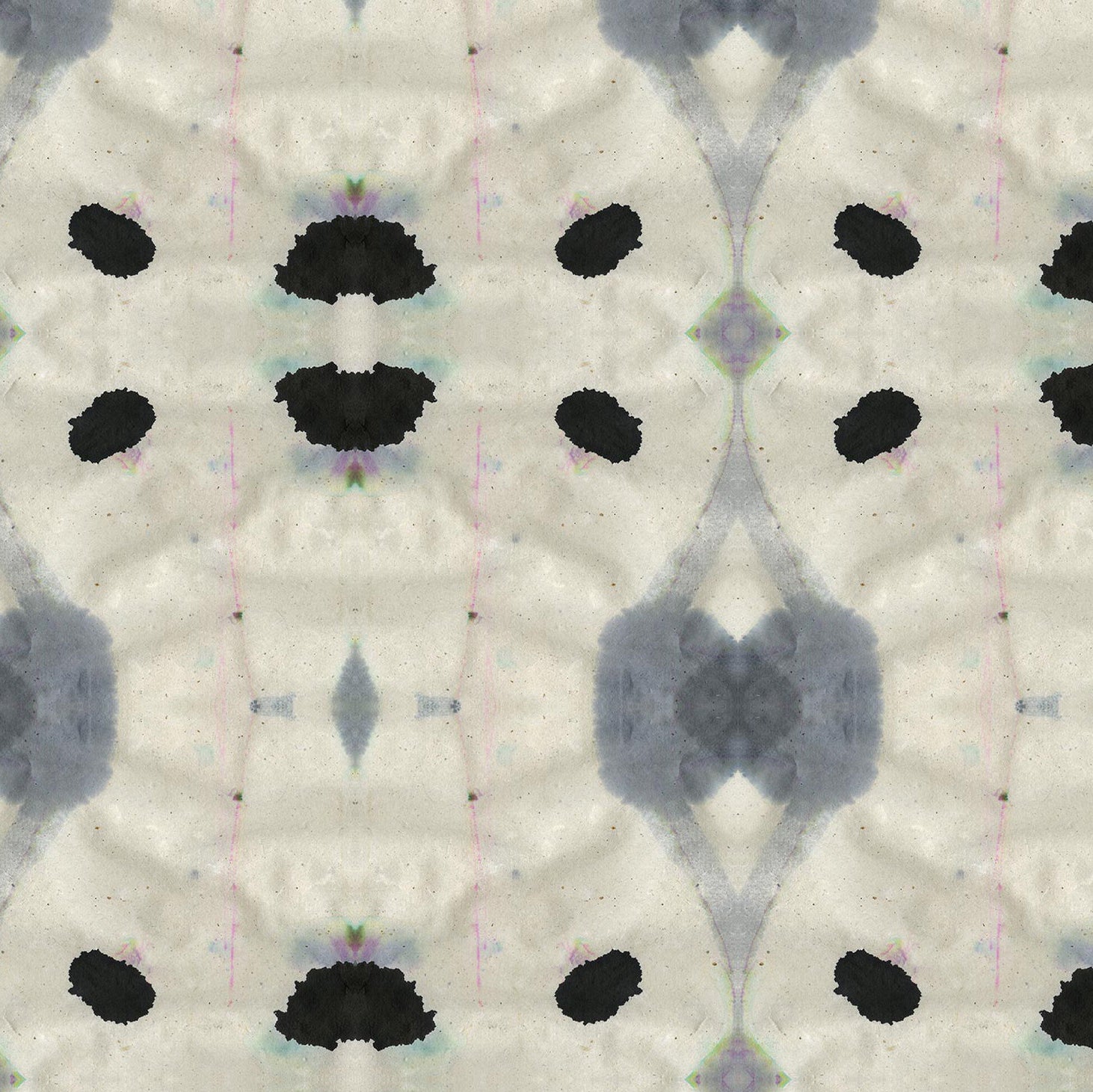 Detail of wallpaper in an abstract ink blot print in shades of charcoal and black on a tan field.