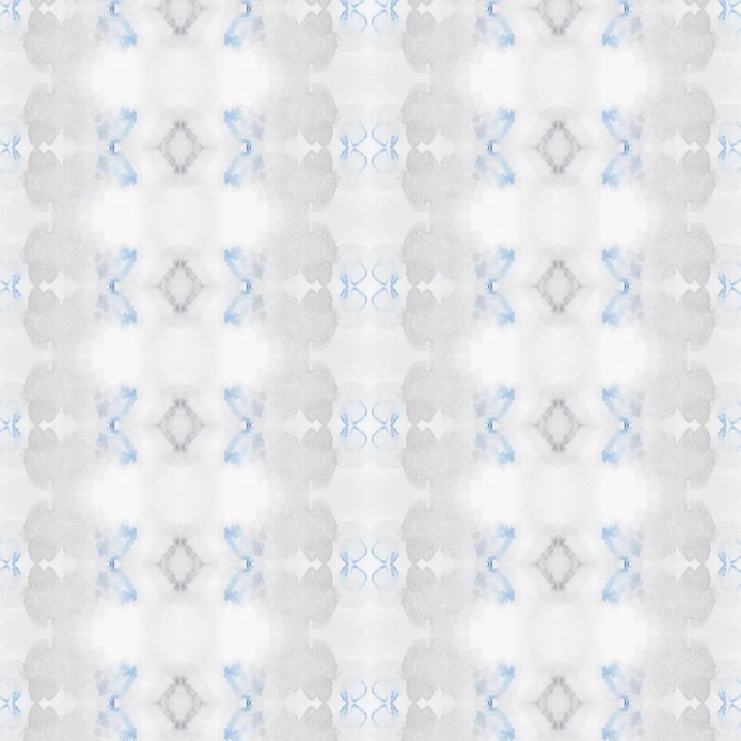 Detail of wallpaper in a striped ink blot print in shades of gray and blue on a cream field.