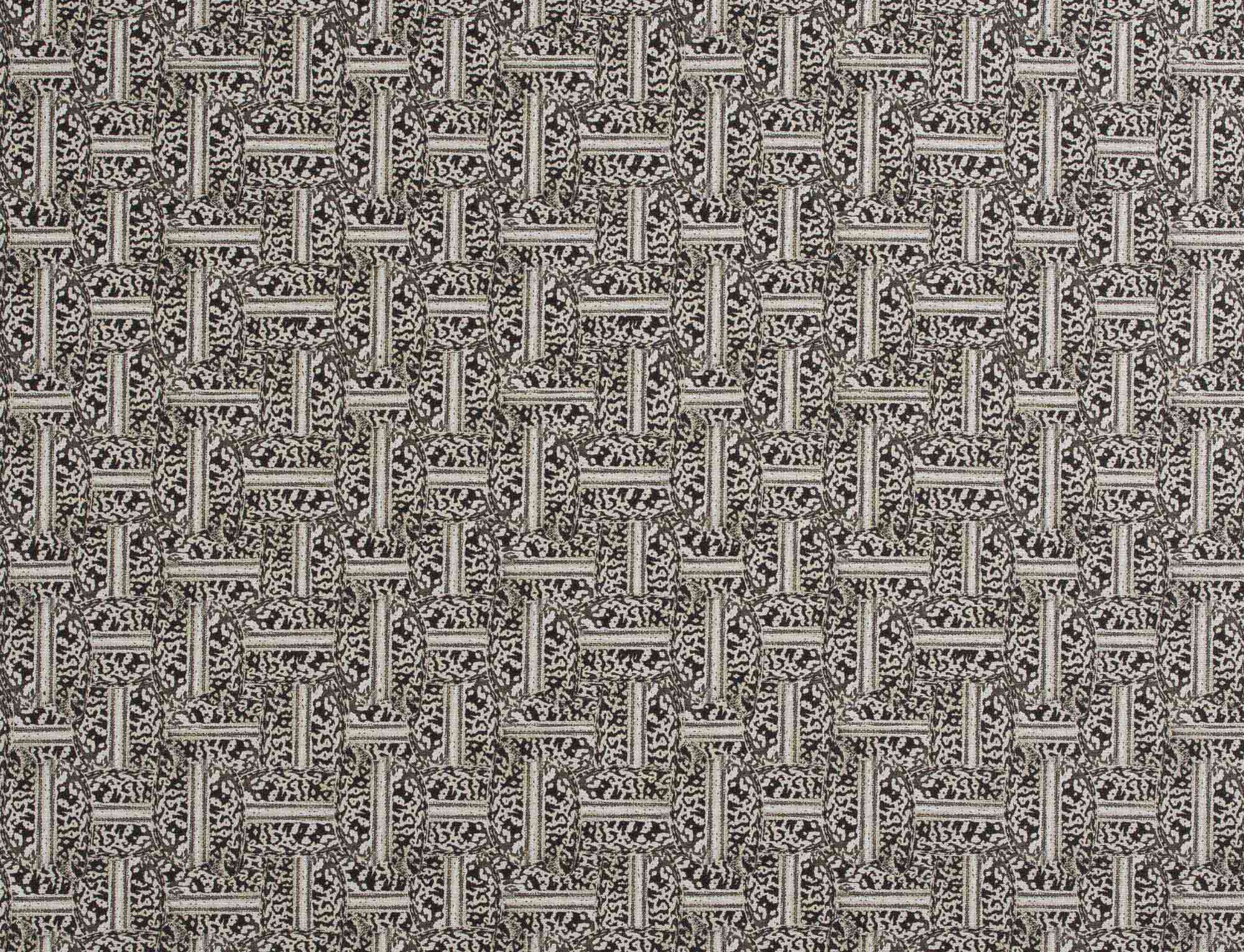 Detail of fabric in a geometric grid pattern in black on a cream field.