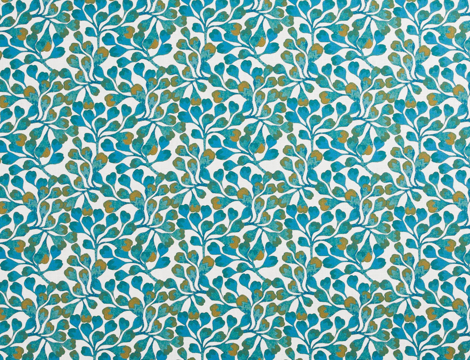 Detail of fabric in an abstract botanical print in blue, turquoise and gold on a white field.