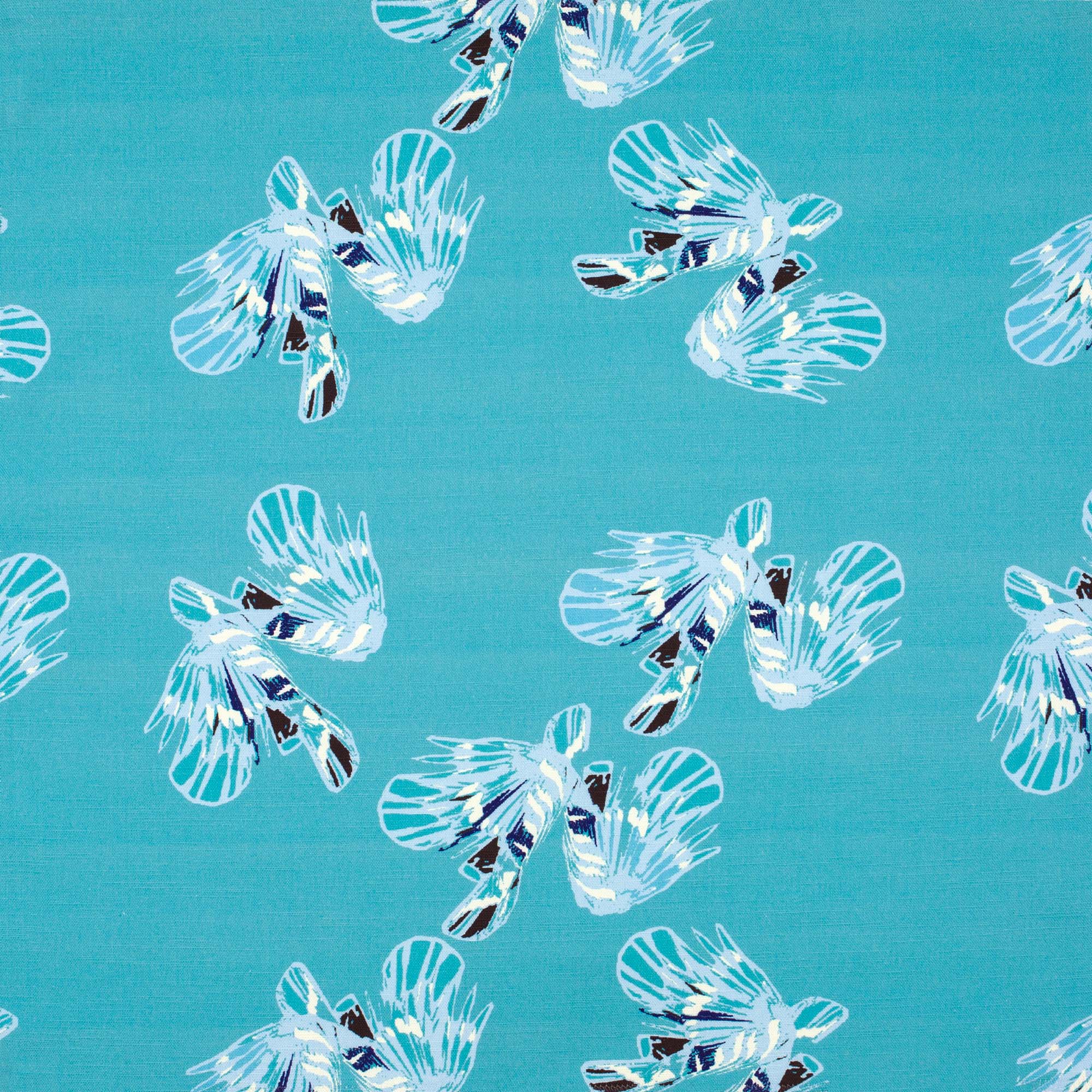 Detail of fabric in a playful feather print in blue and navy on a turquoise field.