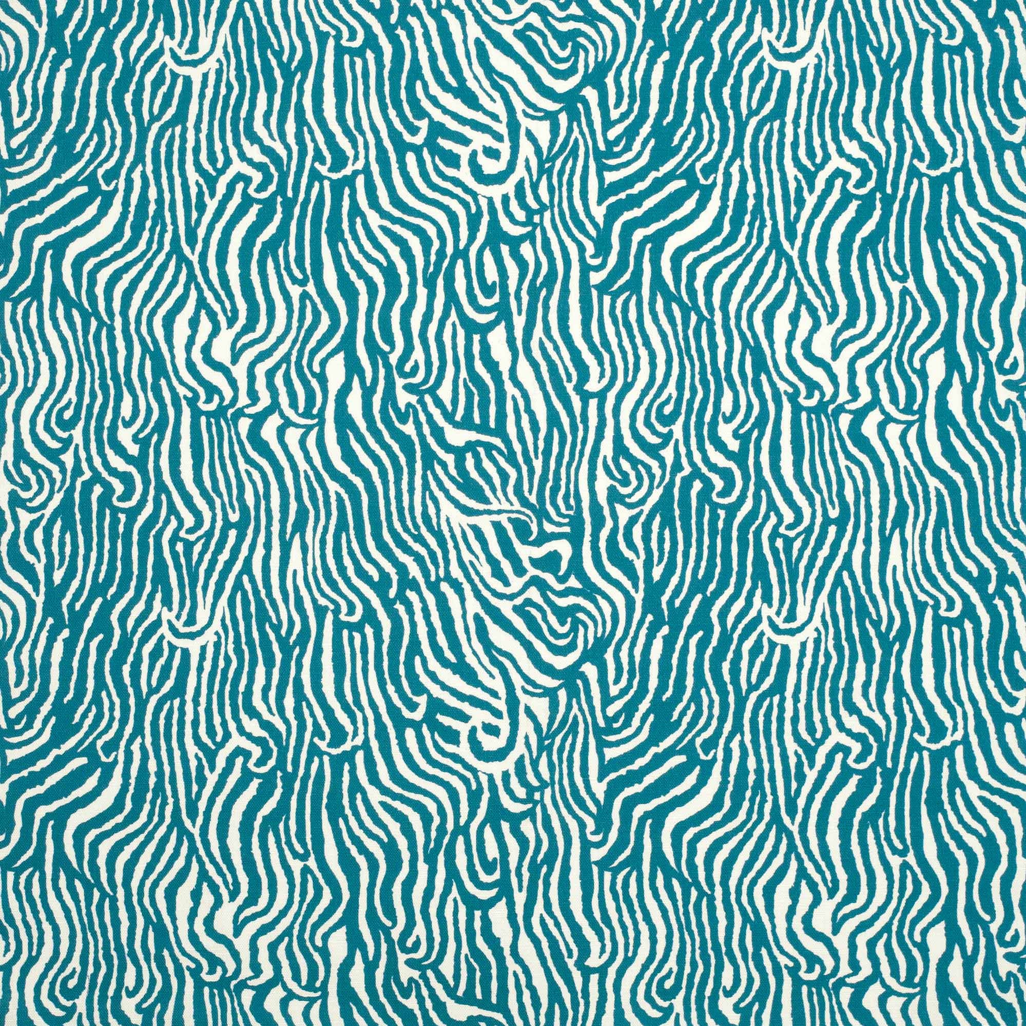 Detail of fabric in a playful animal print in turquoise on a white field.