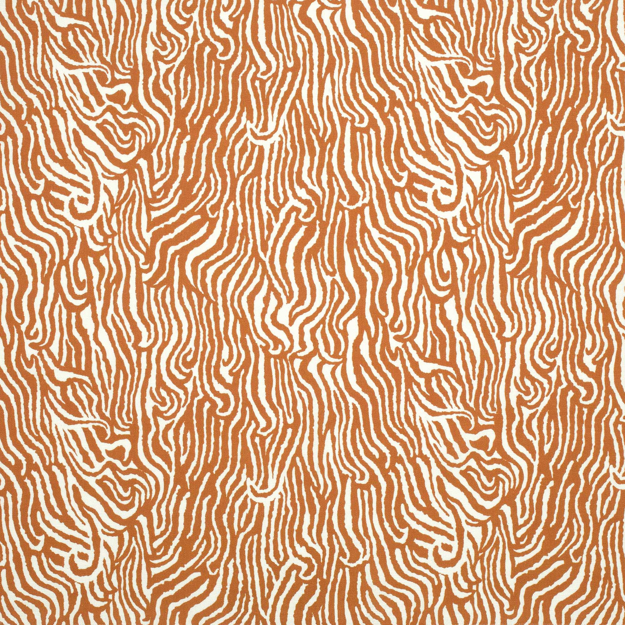 Detail of fabric in a playful animal print in burnt orange on a white field.
