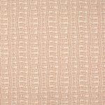 Detail of fabric in a playful curvy grid print in peach on a white field.