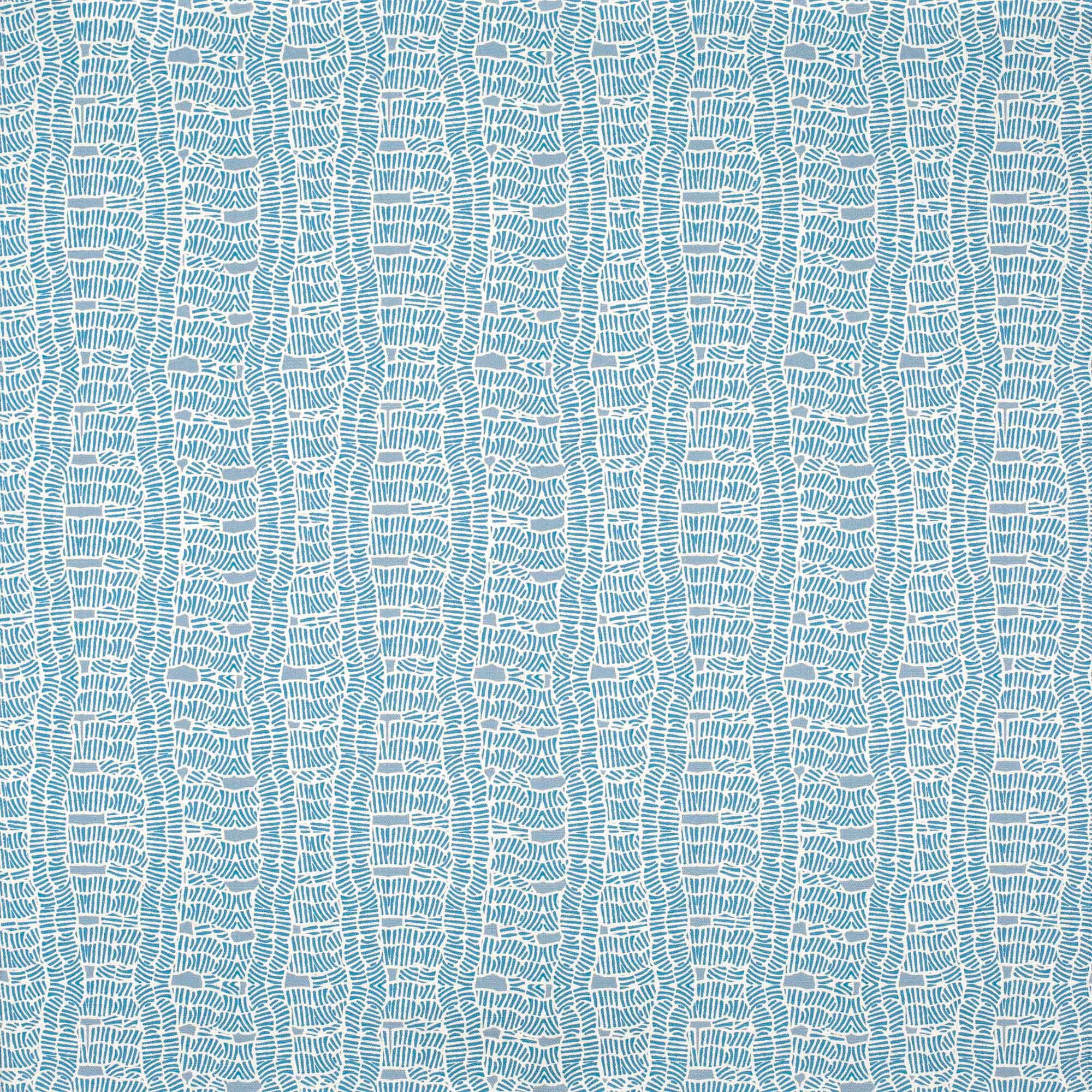 Detail of fabric in a playful curvy grid print in blue on a white field.