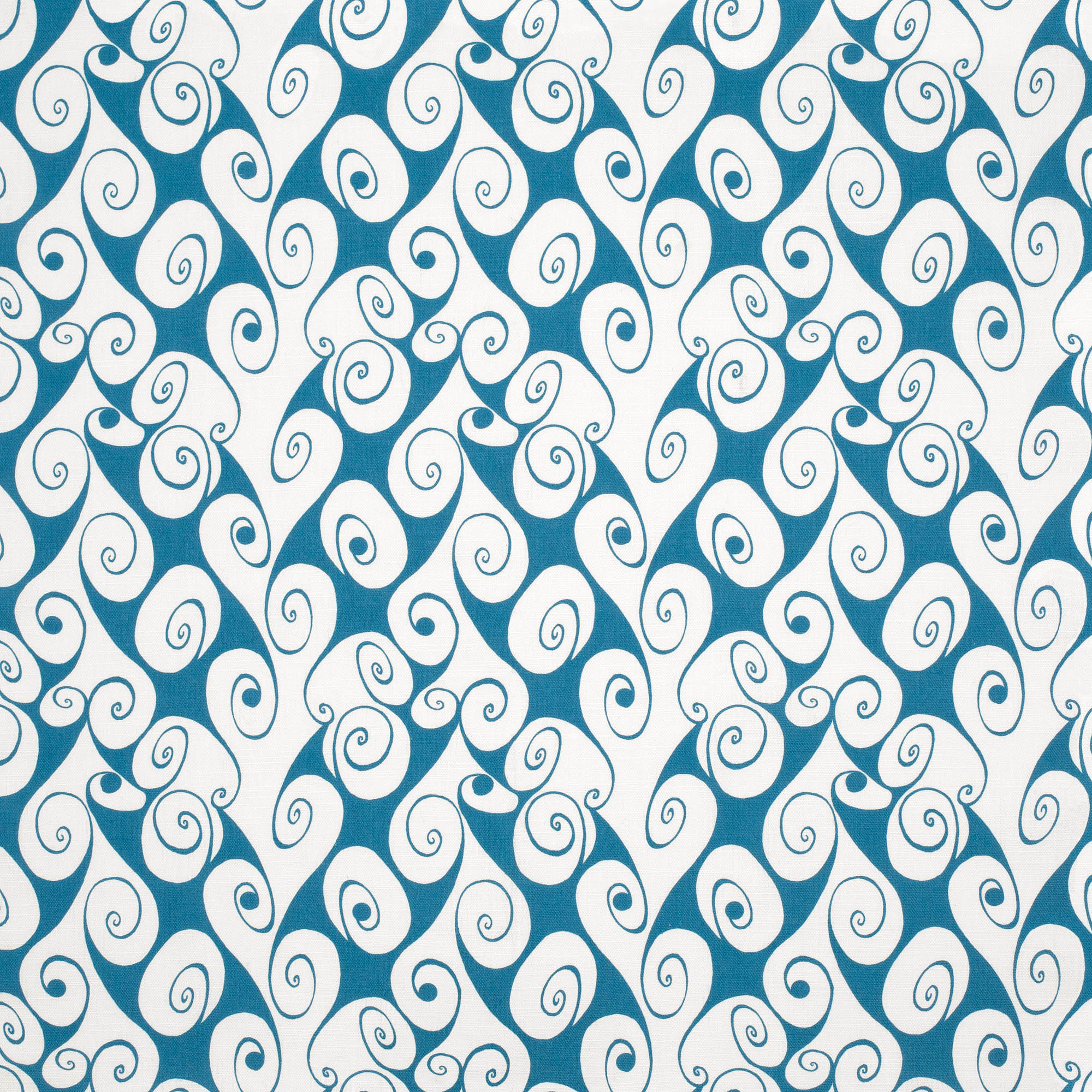 Detail of fabric in a playful abstract shape print in white on a blue field.