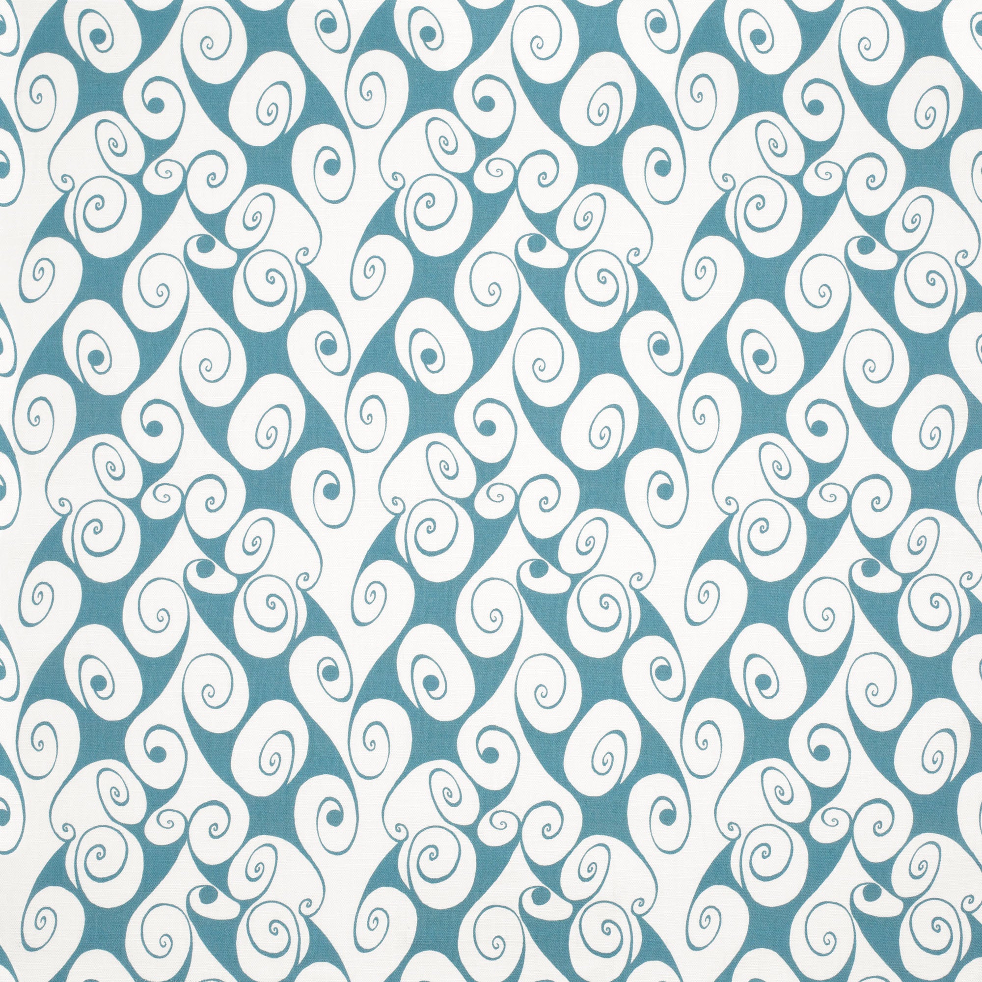 Detail of fabric in a playful abstract shape print in white on a turquoise field.