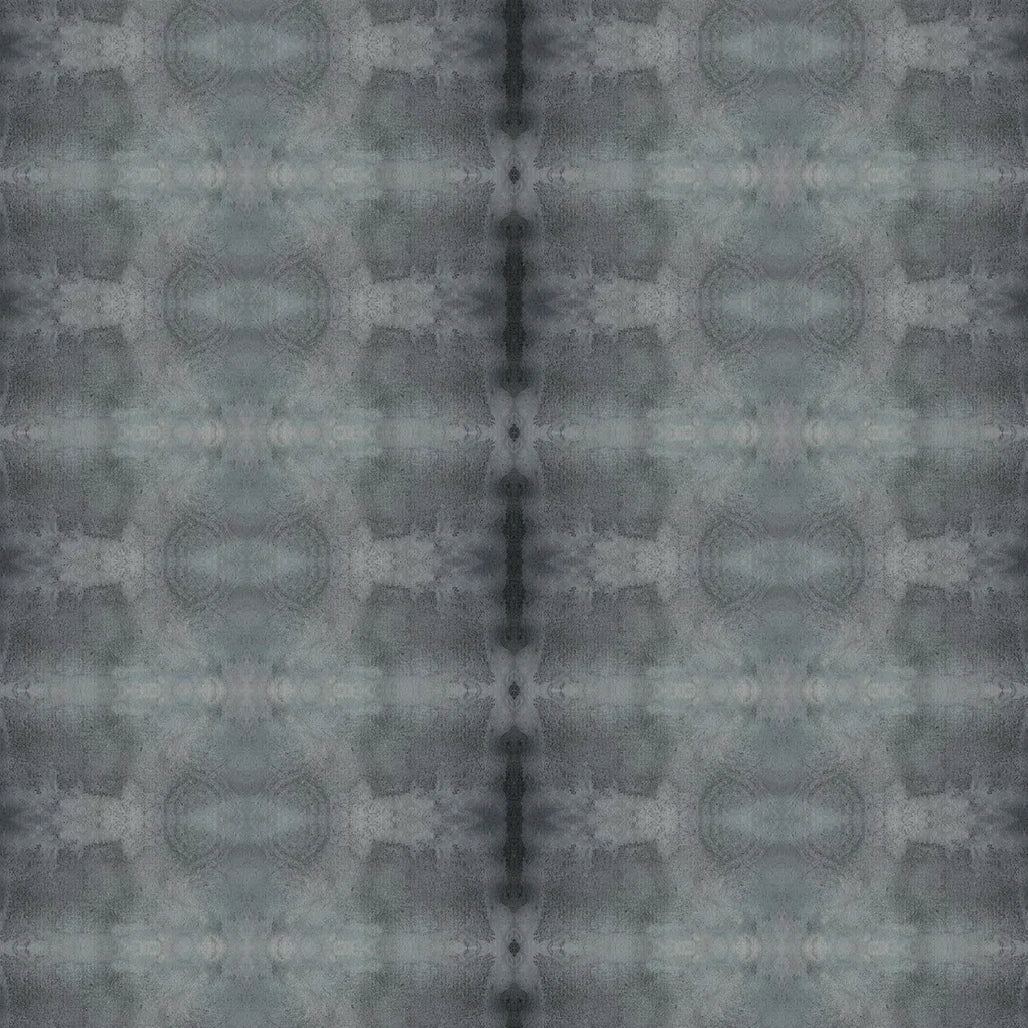 Detail of wallpaper in a repeating ink blot print in shades of gray.