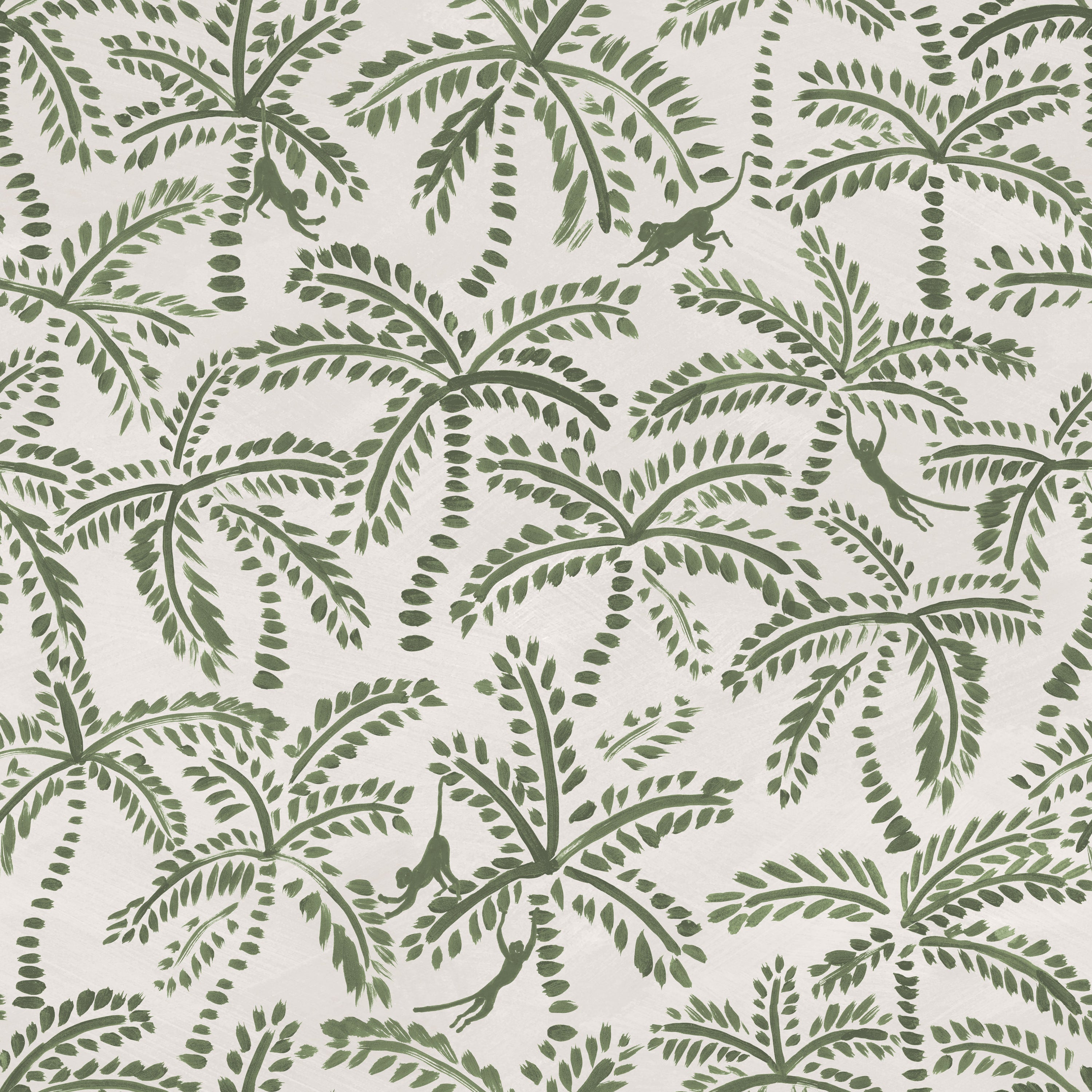 Detail of fabric in a playful palm tree and monkey print in green on a cream field.