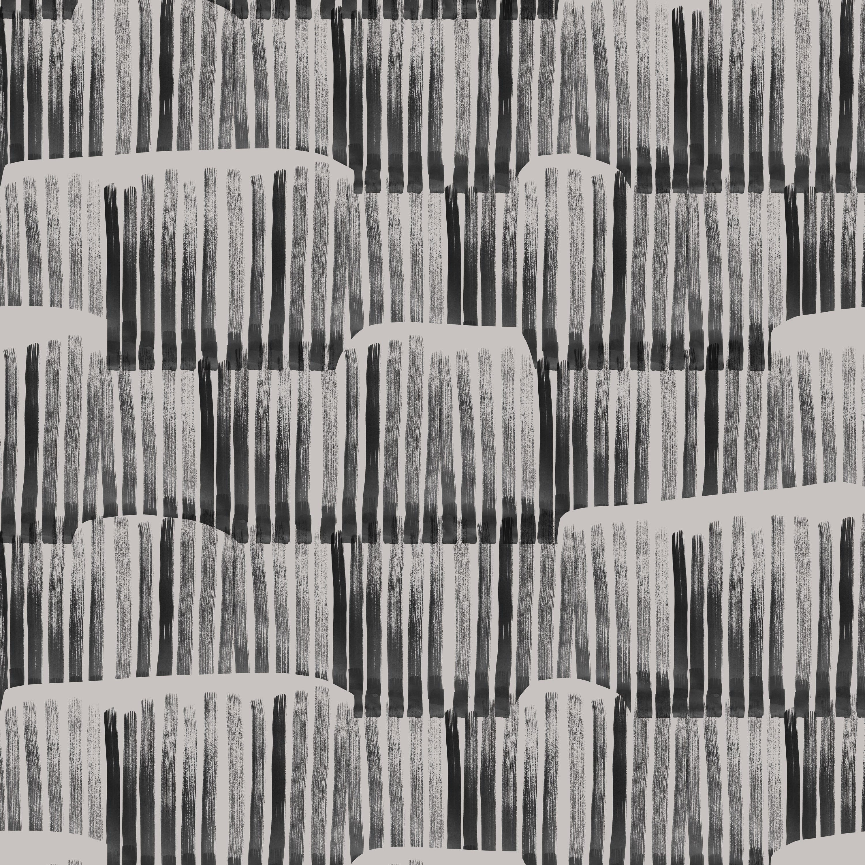 Detail of wallpaper in an irregular textural stripe in black on a white field.