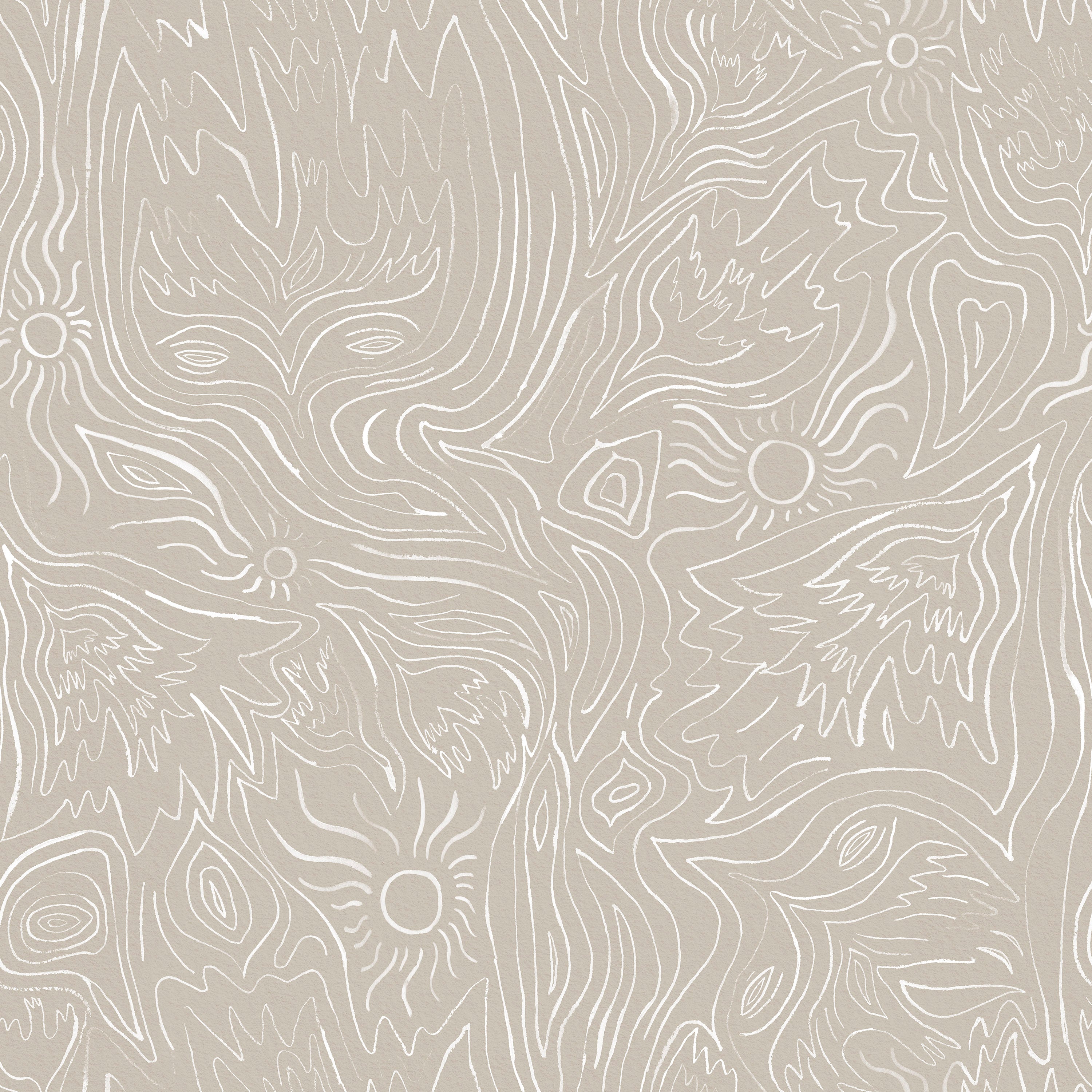 Detail of wallpaper in a playful abstract sun print in white on a cream field.