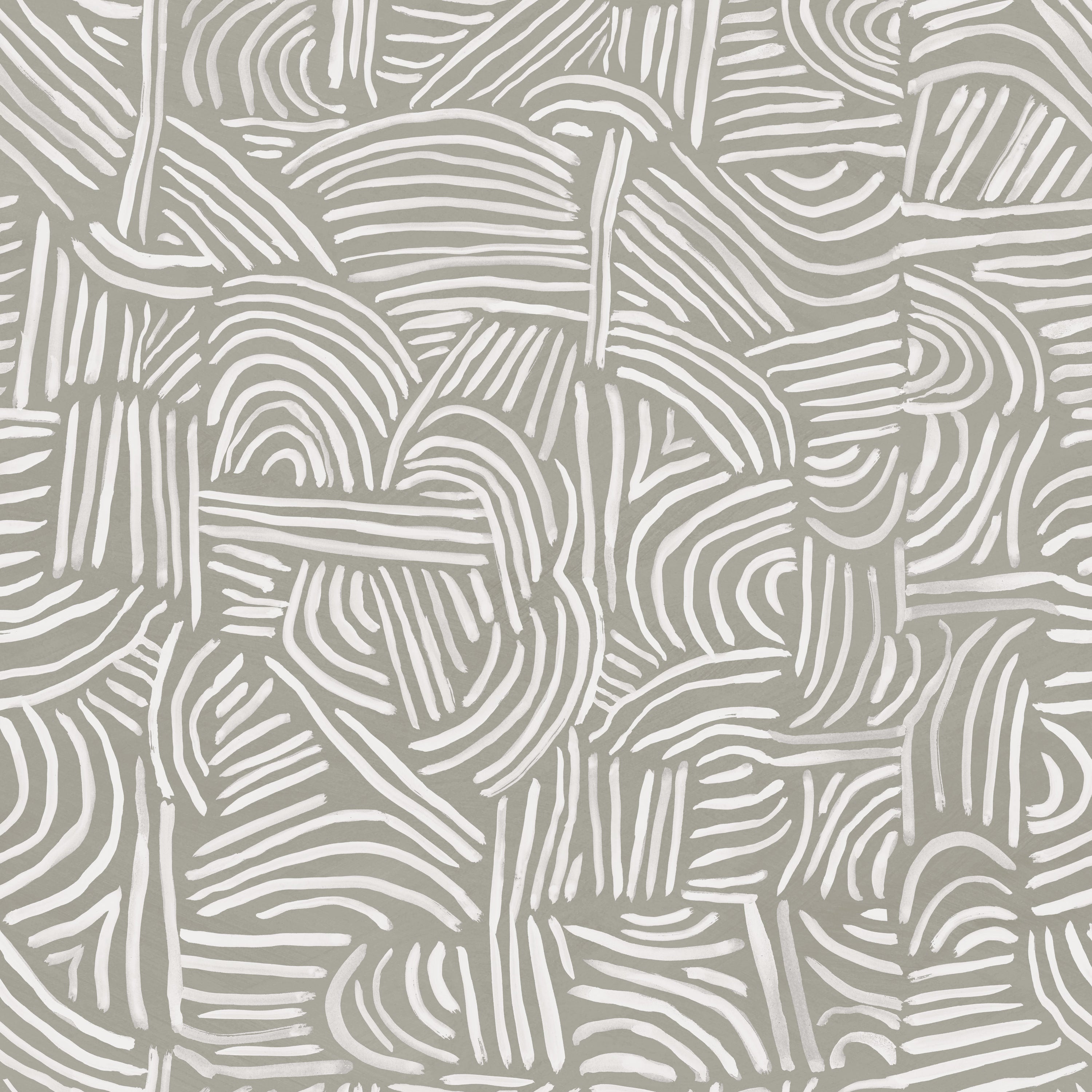 Detail of fabric in an abstract linear print in white on a sage field.