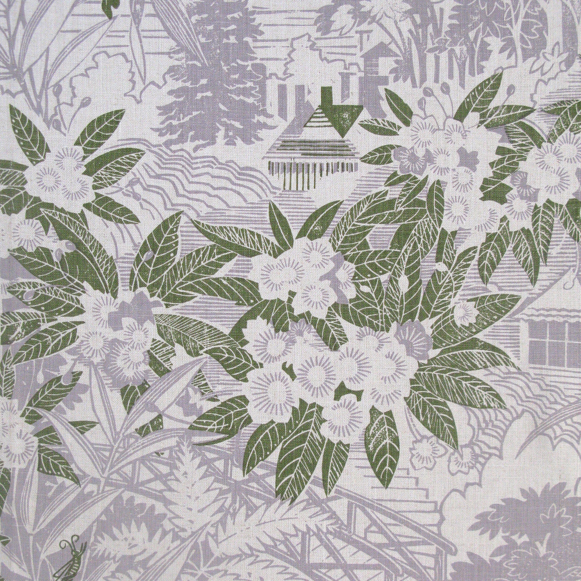 Detail of fabric in an intricate botanical, bridge and house print in sage and purple on a cream field.