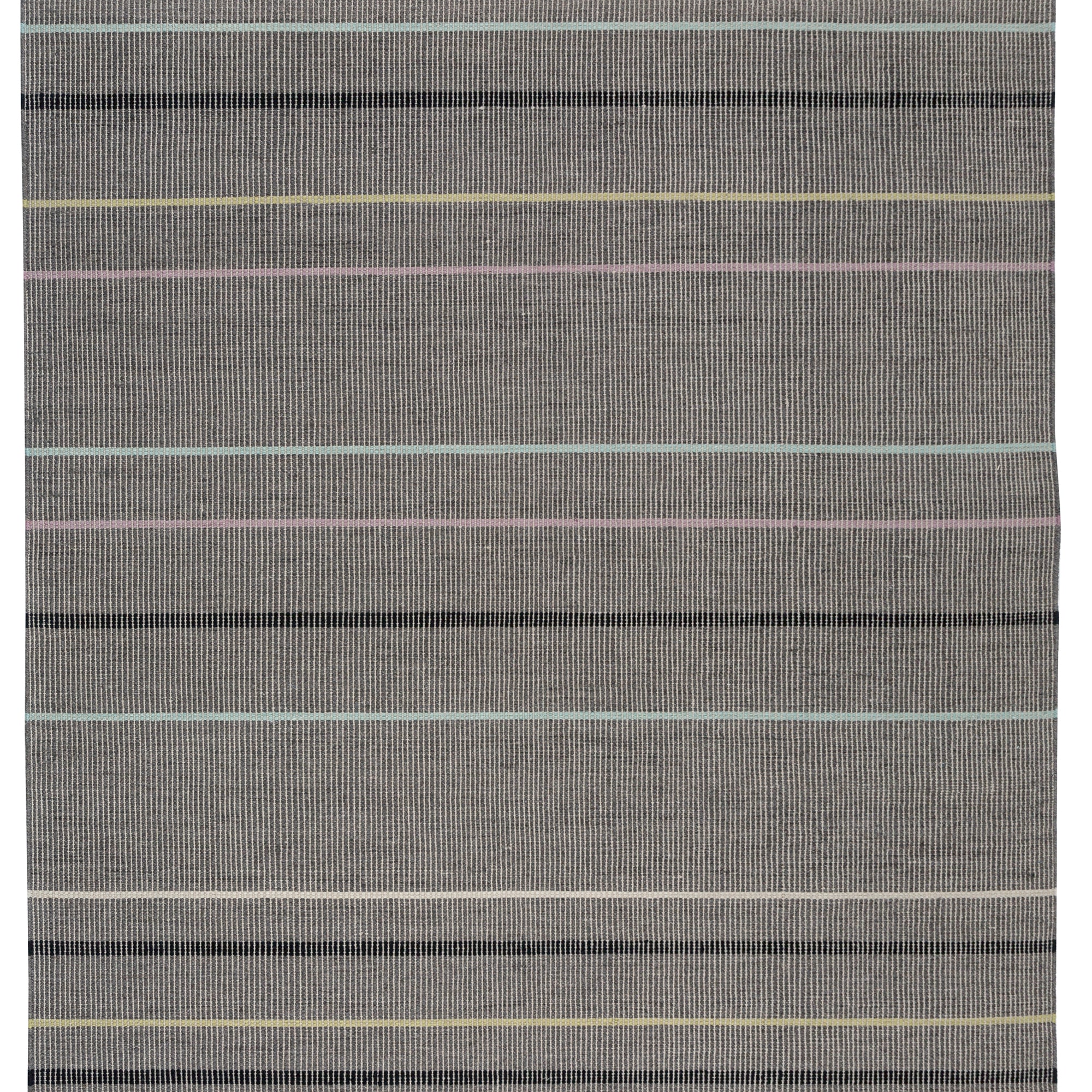 Full size Jasper Waffle Rug in Jet, widely spaced thin stripes of yellow, pink, black, acqua and white on a grey field.