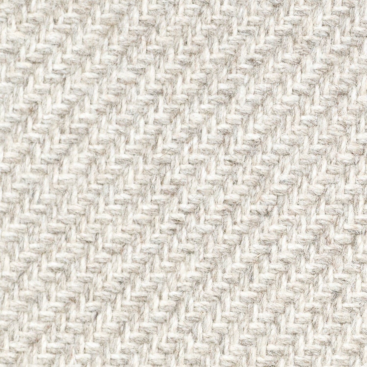 Wool broadloom carpet swatch in a high-pile diagonal stripe in mottled white and cream.