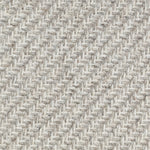 Wool broadloom carpet swatch in a high-pile diagonal stripe in mottled light gray and cream.