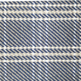 Wool broadloom carpet swatch in houndstooth plaid in shades of navy, cream and white.