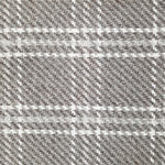 Wool broadloom carpet swatch in houndstooth plaid in shades of gray and cream.