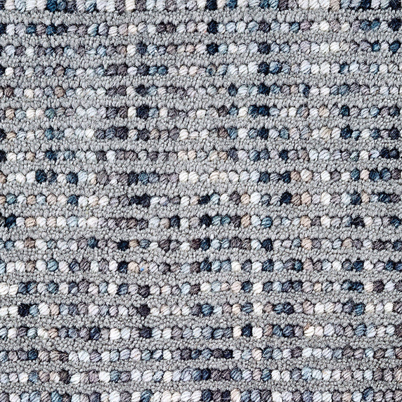 Wool broadloom carpet swatch in a looped stripe weave in gray, blue, cream and tan.