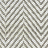 Outdoor broadloom carpet swatch in a herringbone weave in gray and cream.