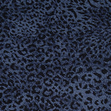 Wool-blend broadloom carpet swatch in a dense leopard print in black on a navy field.