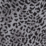 Wool-blend broadloom carpet swatch in a dense leopard print in black on a gray field.