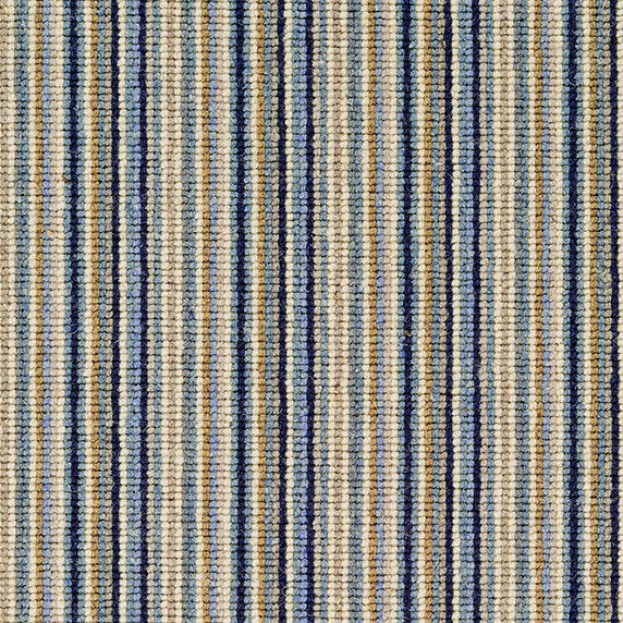 Wool broadloom carpet swatch in a thin stripe pattern in shades of cream, tan, blue and black.