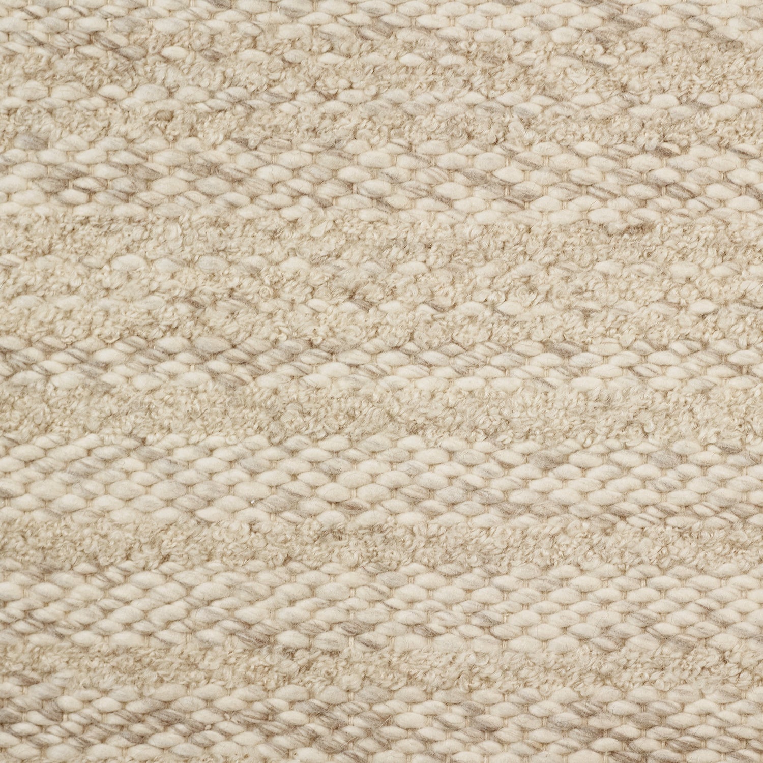 Wool broadloom carpet swatch in a textured stripe weave in tan.