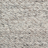 Wool broadloom carpet swatch in a textured stripe weave in mottled gray.
