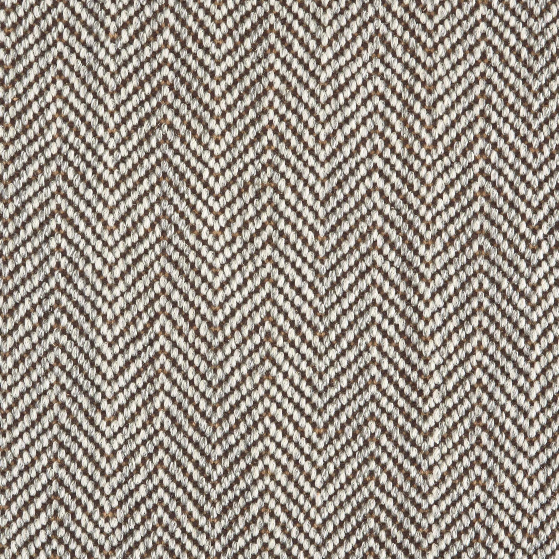 Wool broadloom carpet swatch in a herringbone weave in cream and brown.