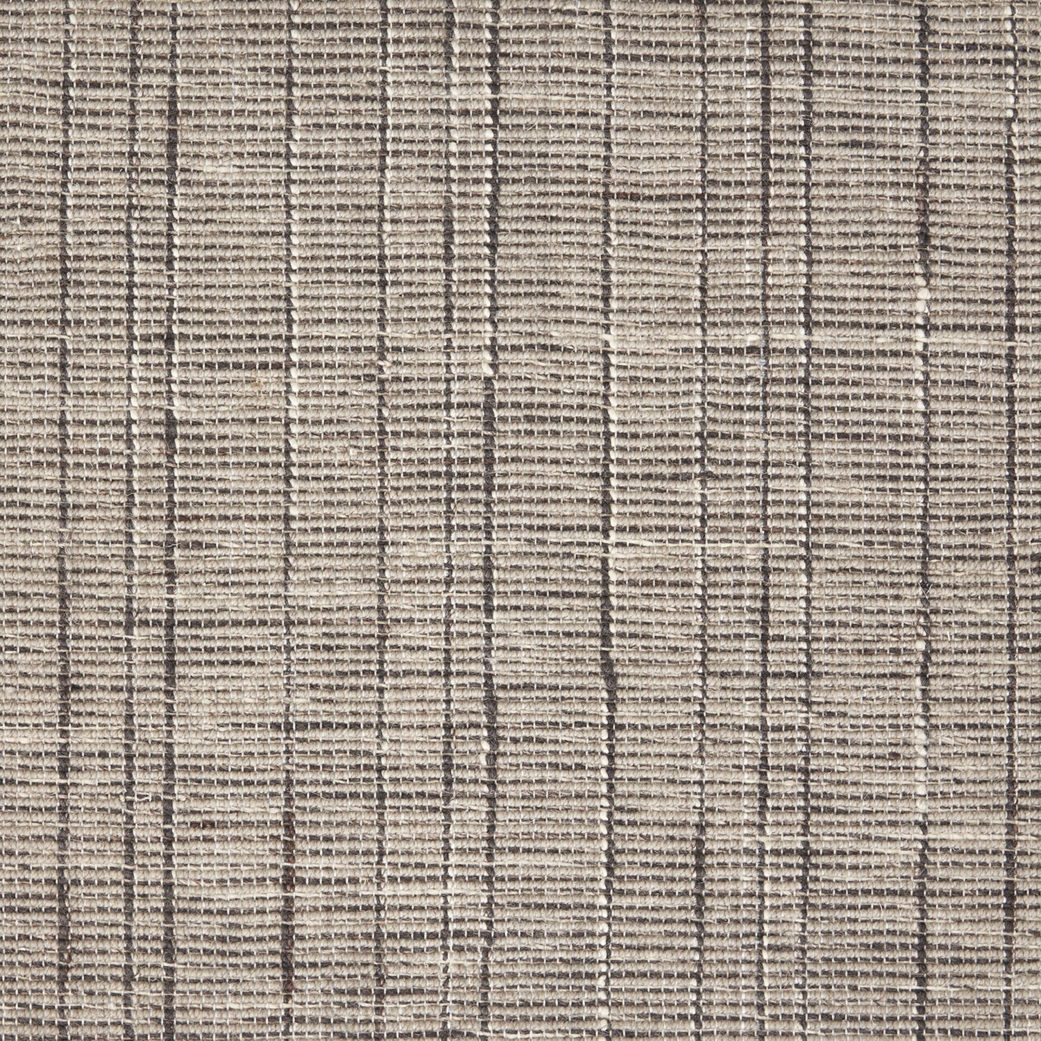 Wool-nylon broadloom carpet swatch in a textured plaid weave in shades of brown.