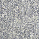Wool broadloom carpet swatch in a textured weave in mottled navy and cream.