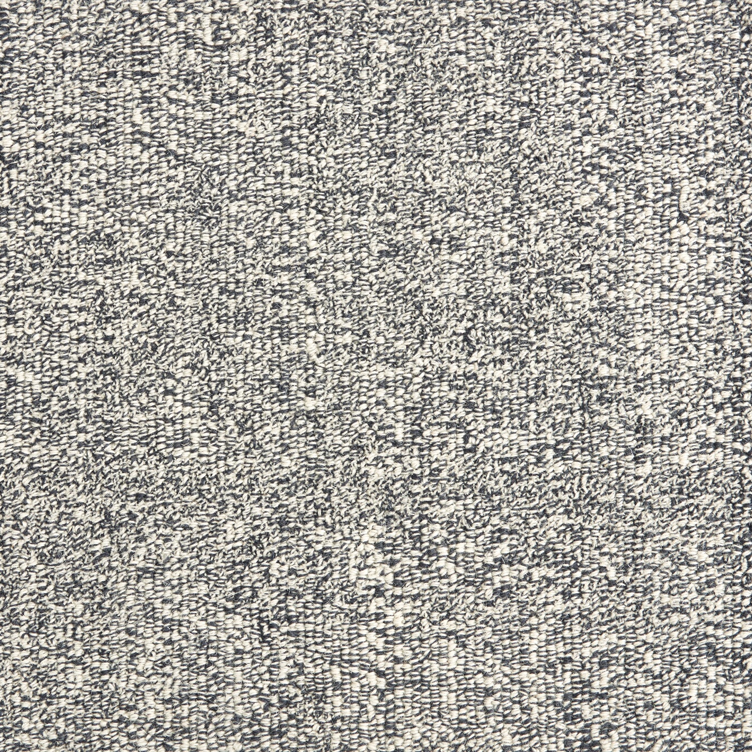 Wool broadloom carpet swatch in a textured weave in mottled white and charcoal.