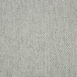 Wool-blend broadloom carpet swatch in a flat herringbone weave in mottled green-gray.
