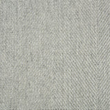 Wool-blend broadloom carpet swatch in a flat herringbone weave in mottled green-gray.
