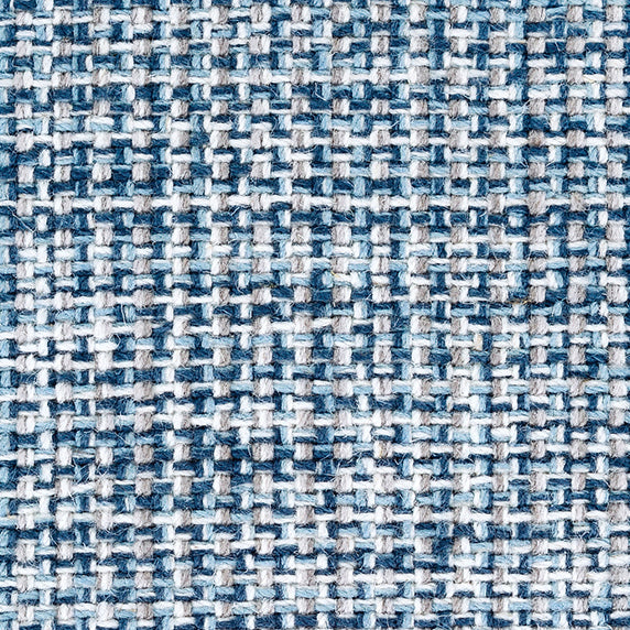 Wool broadloom carpet swatch in a tweed weave in mottled blue, gray and white.