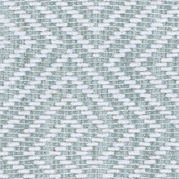 Wool broadloom carpet swatch in a dimensional geometric weave in light teal and white.