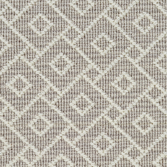 Wool broadloom carpet swatch in an interlocking geometric print in white and light gray.