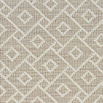 Wool broadloom carpet swatch in an interlocking geometric print in cream and tan.