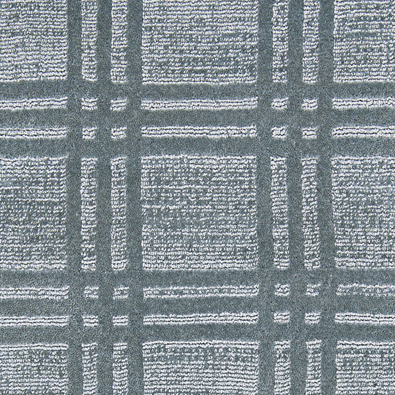 Nylon broadloom carpet swatch in a dimensional plaid weave in gray.