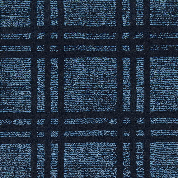 Nylon broadloom carpet swatch in a dimensional plaid weave in dark navy.