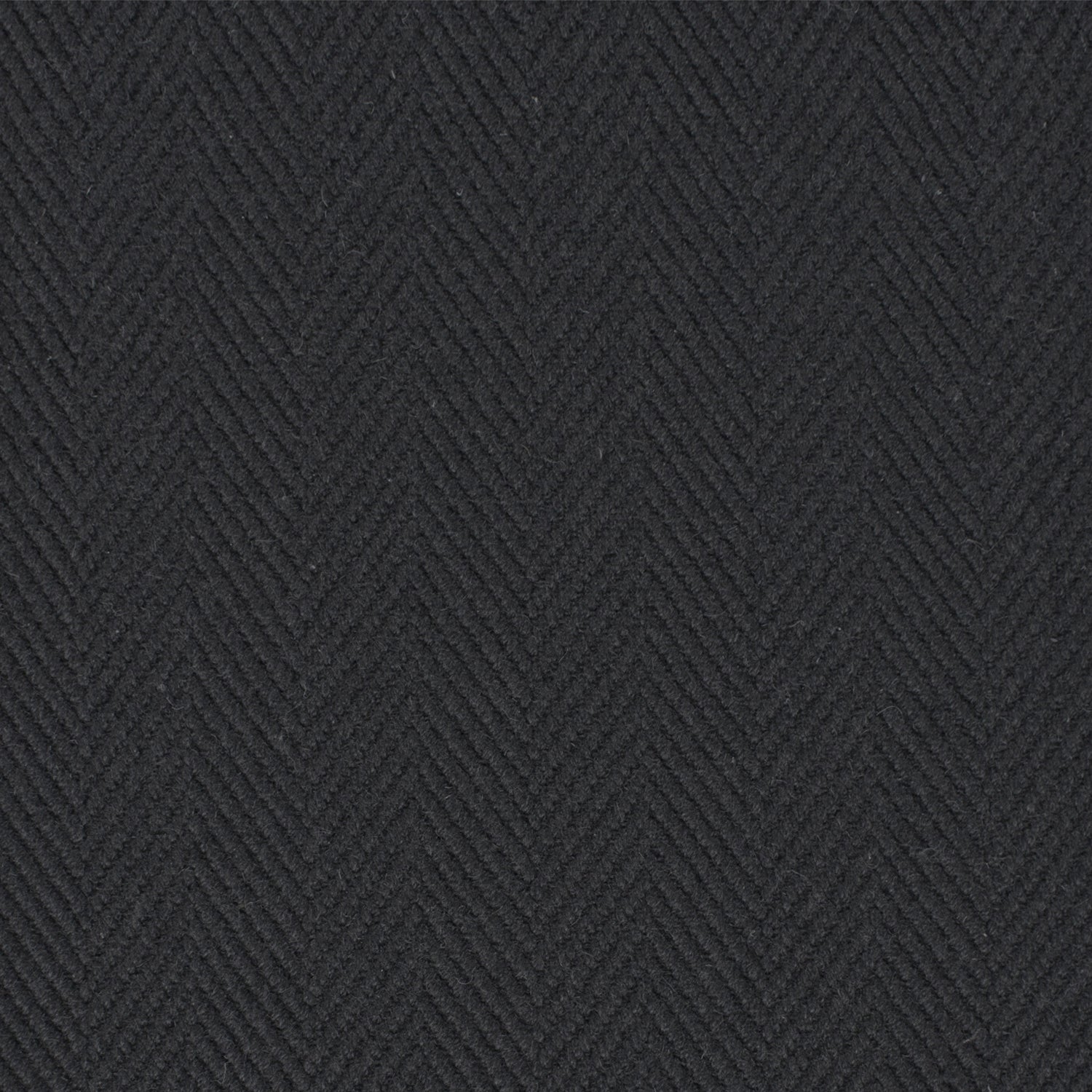 Wool broadloom carpet swatch in a herringbone weave in charcoal.
