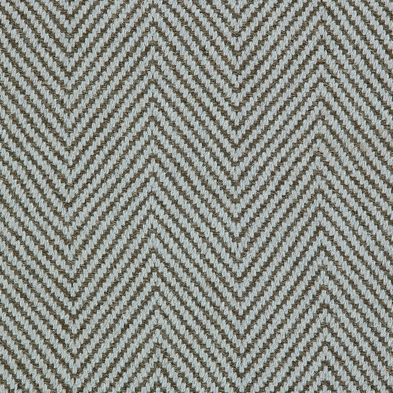 Wool broadloom carpet swatch in a herringbone weave in light brown and sky blue.