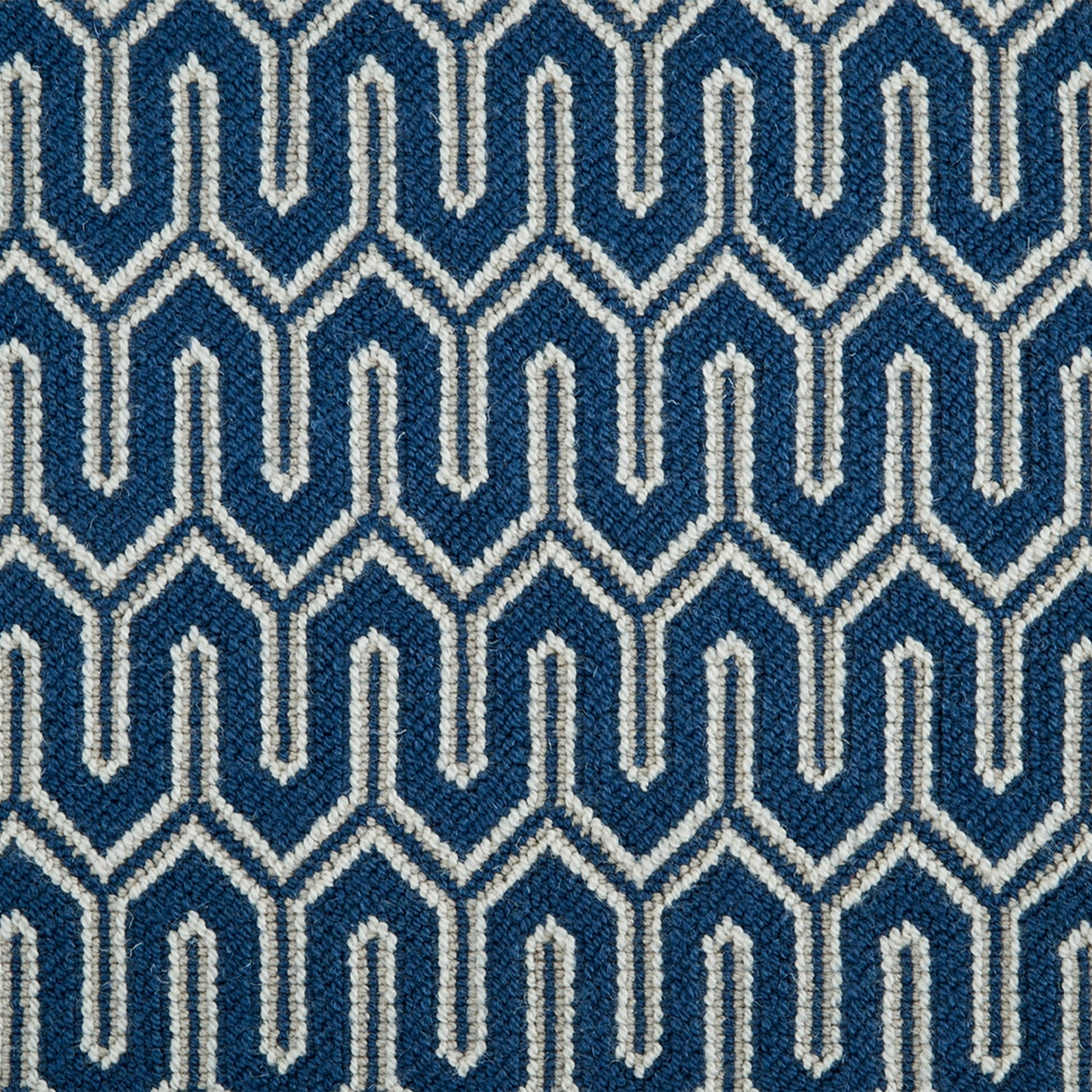 Wool-blend broadloom carpet swatch in a chunky geometric linear weave in cream, tan and navy.