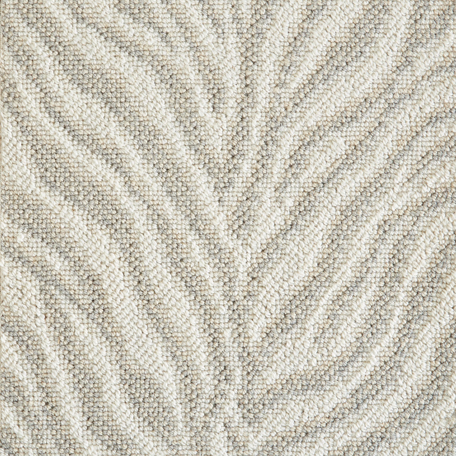 Wool-blend broadloom carpet swatch in an animal print in shades of cream, tan and gray.