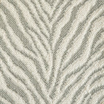 Wool-blend broadloom carpet swatch in an animal print in shades of cream, tan and sage.